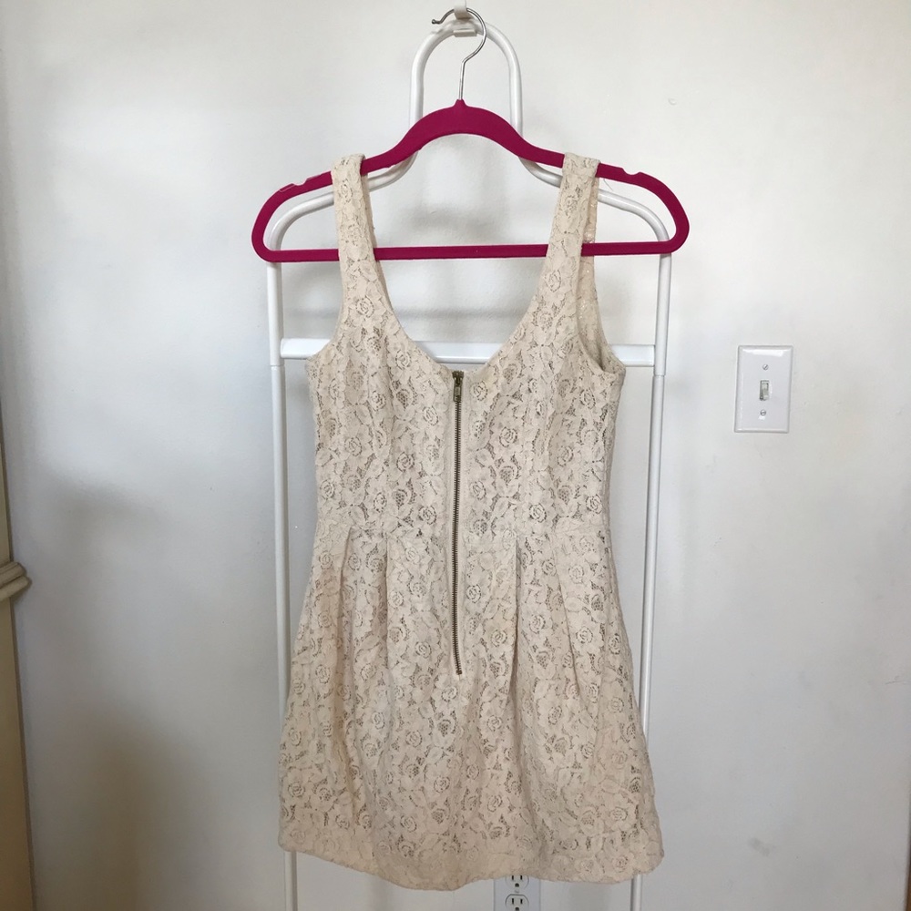 Cream lace dress.